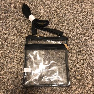 Small clear purse with 2 pockets and a strap new